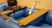 Front seat and bench seat fitted across a raft