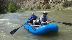 Blue Hyside Max 12.0 raft on a river